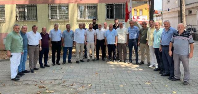 İKİ BAŞKAN  EL ELE